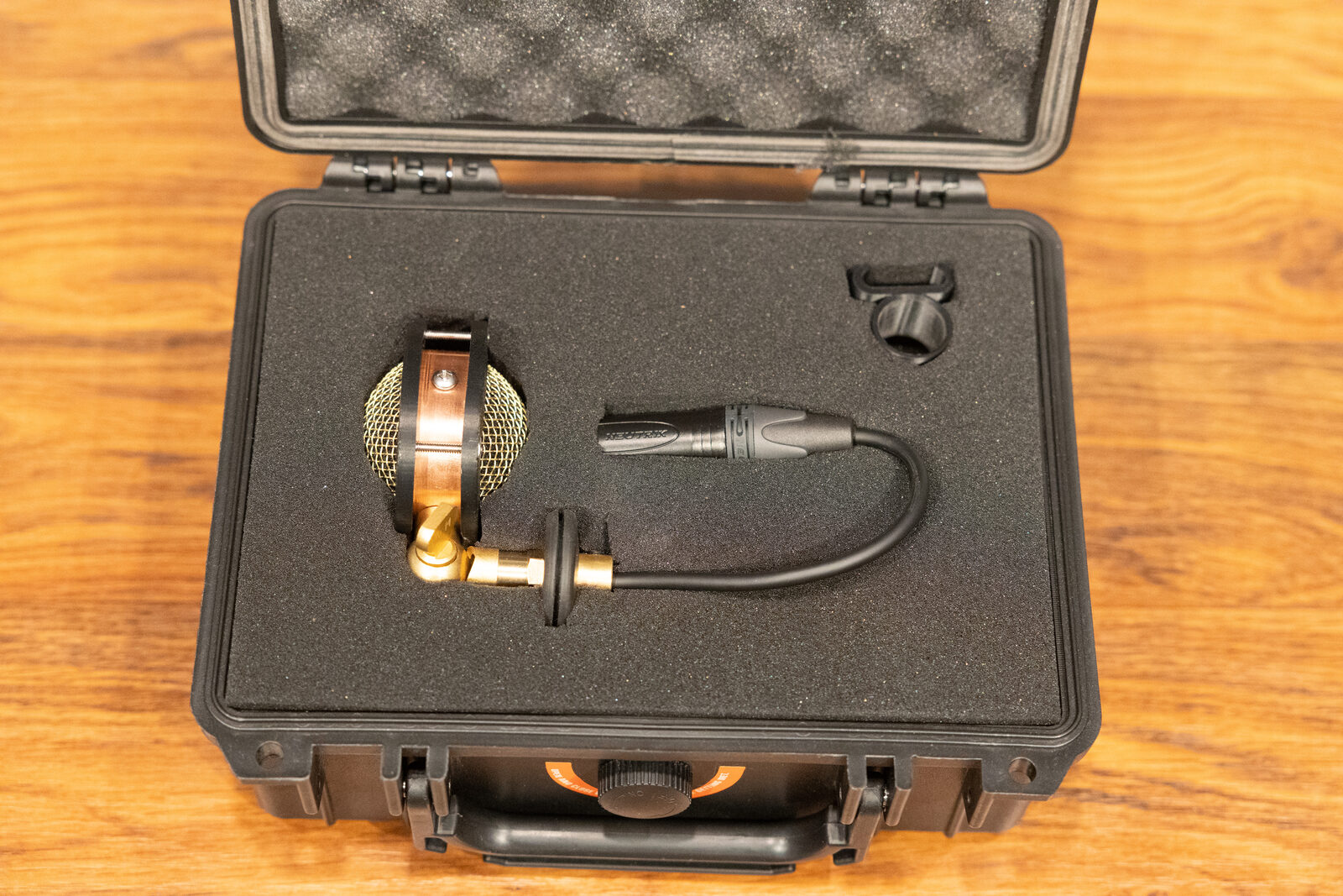 Top-down view of Chester V2 nestled in the hard-shell case foam